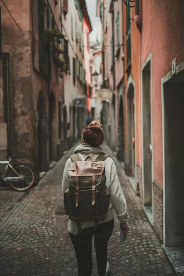 Independent traveller exploring a European old town