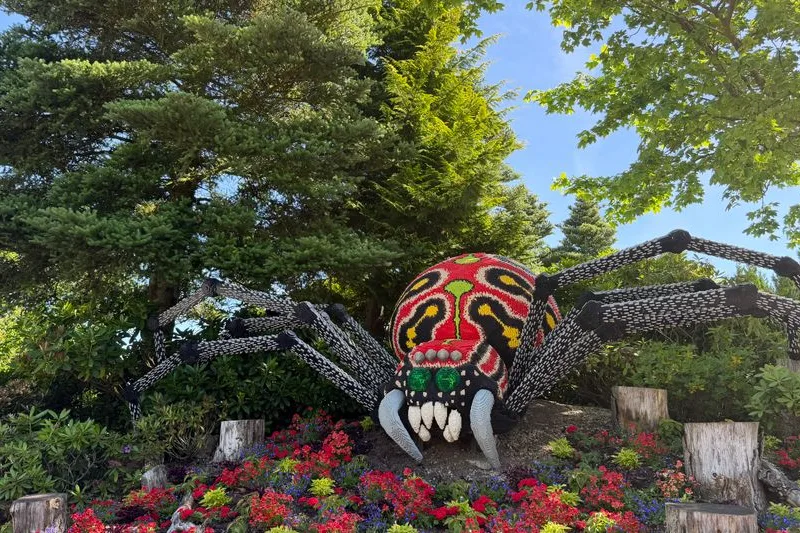 A large brick sculpture in the gardens at Legoland Billund