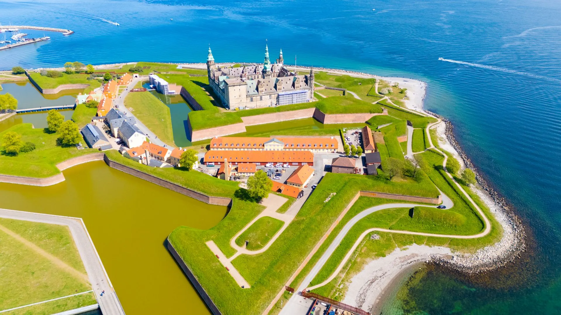 Kronborg Castle at Helsingor from above, with its star-shaped ramparts beside the sound