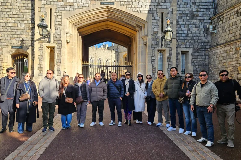 An HCG group in the gateway of an English castle