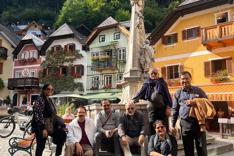An HCG group on the steps in the village of Hallstatt, Austria