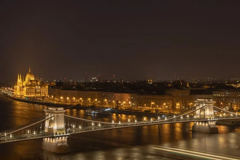 The Chain Bridge and the floodlit Parliament on the Danube at night